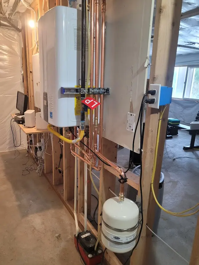 Licensed plumber repairing a kitchen sink in Wabash